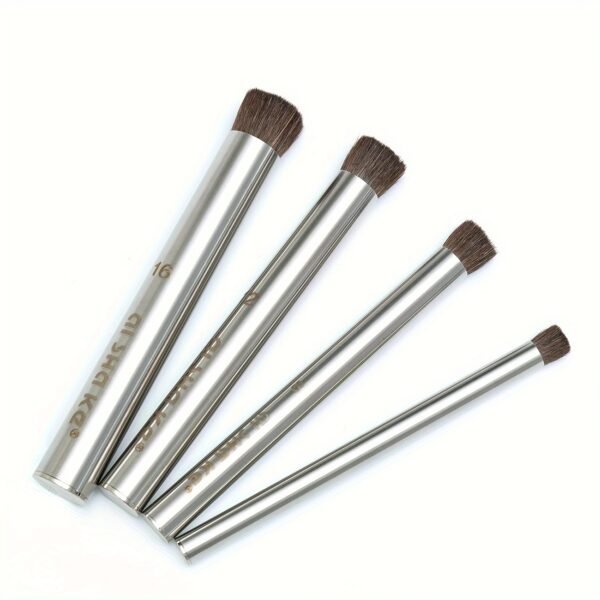 4 black steel pipes with pig bristles