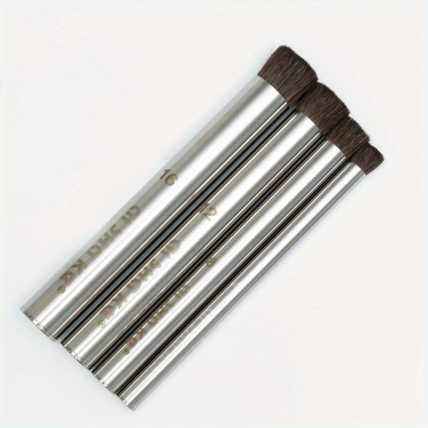 4 black steel pipes with pig bristles