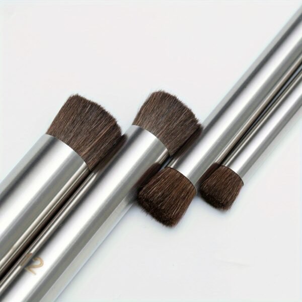 4 black steel pipes with pig bristles