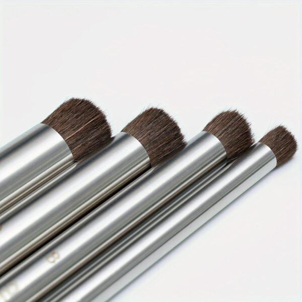 4 black steel pipes with pig bristles